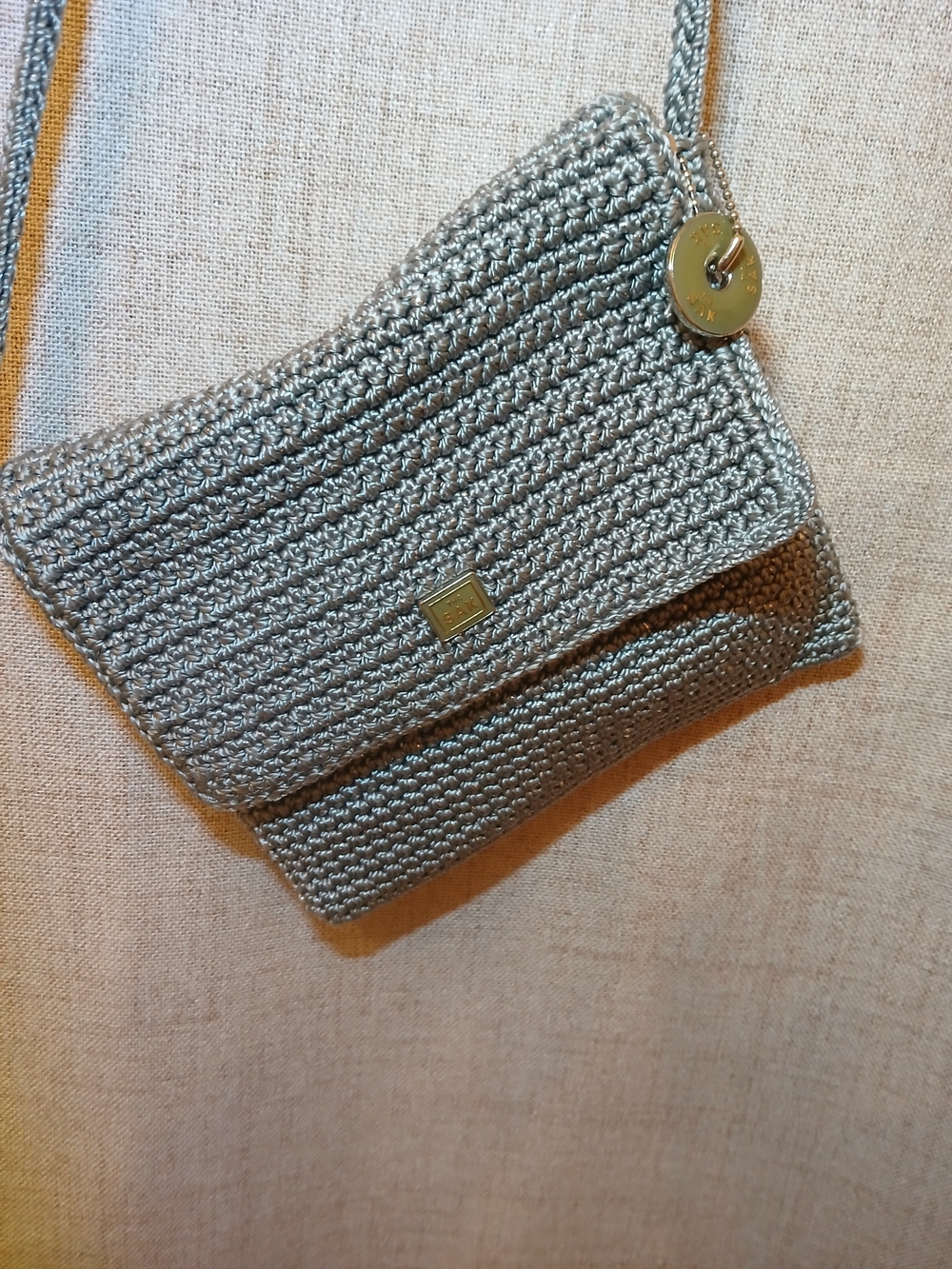 The Sak Silver Woven Crossbody Bag